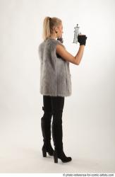 NIKOL STANDING POSE WITH TWO GUNS